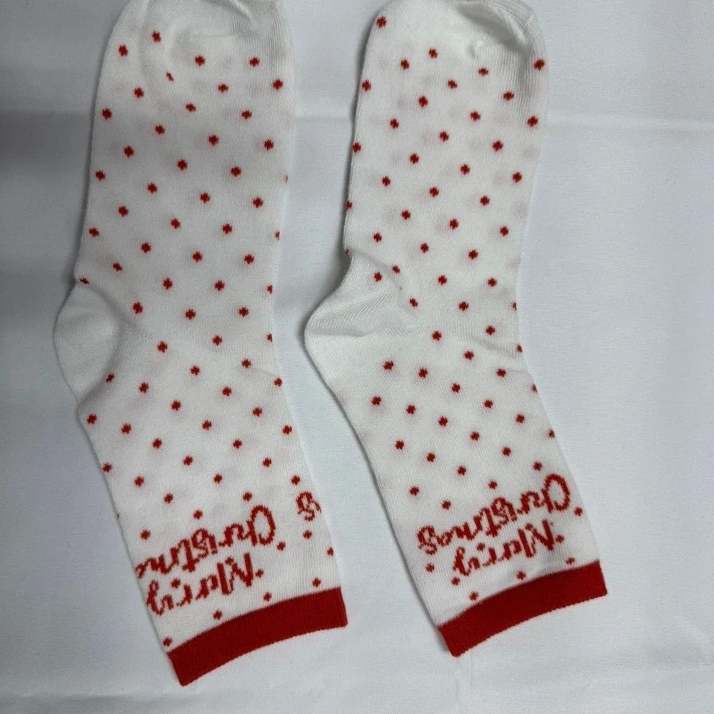 Women's Christmas-themed crew socks NEW in Bag.‎